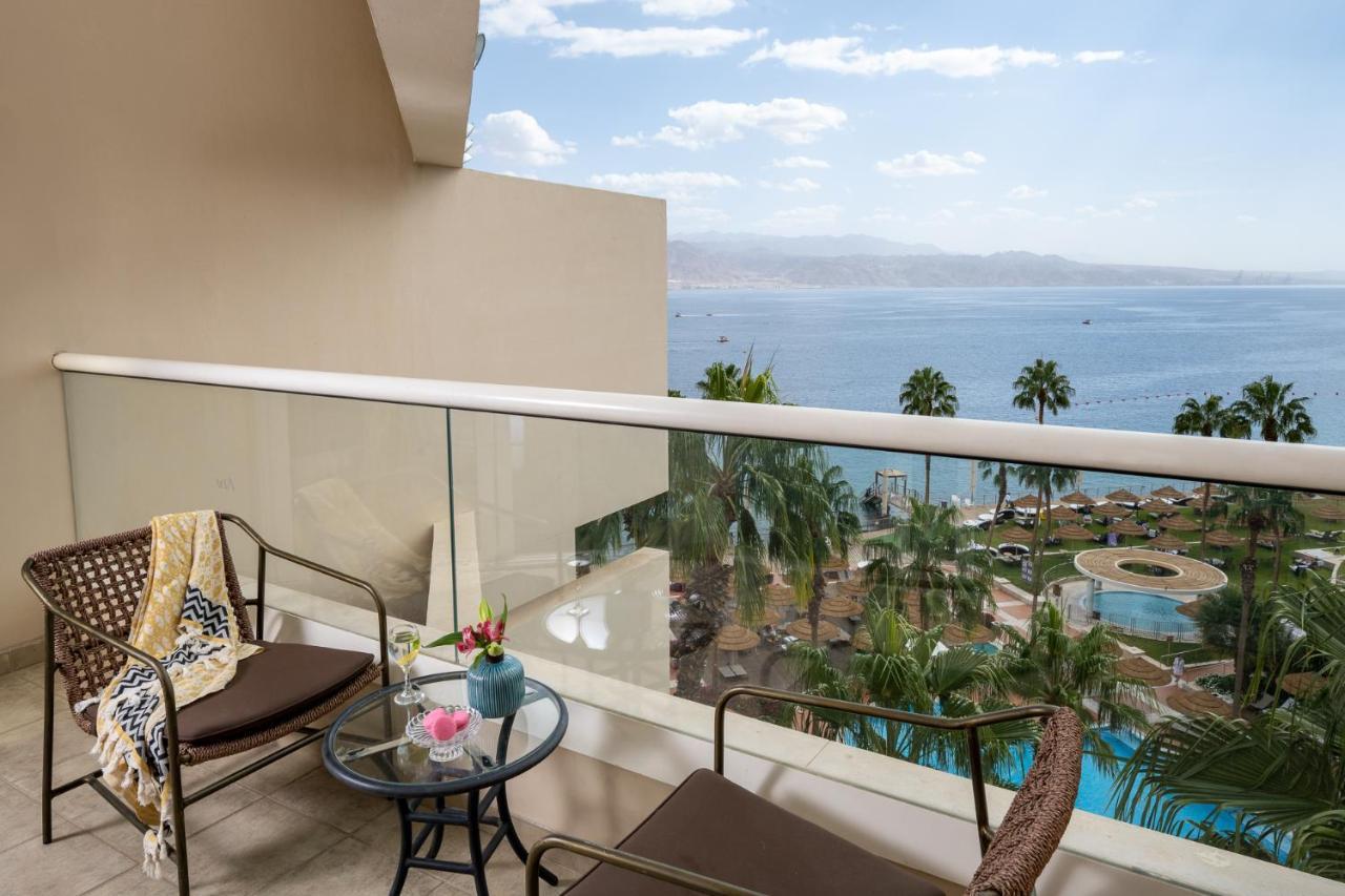 Aria Hotell Eilat Exteriör bild View of the Sea of Galilee from the balcony of a room at the Kempinski Hotel, Tiberias